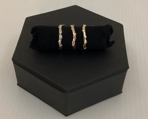 Coral stick ring with scattered diamonds
