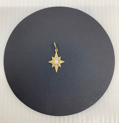 Erica Molinari Gold star with diamond baguette