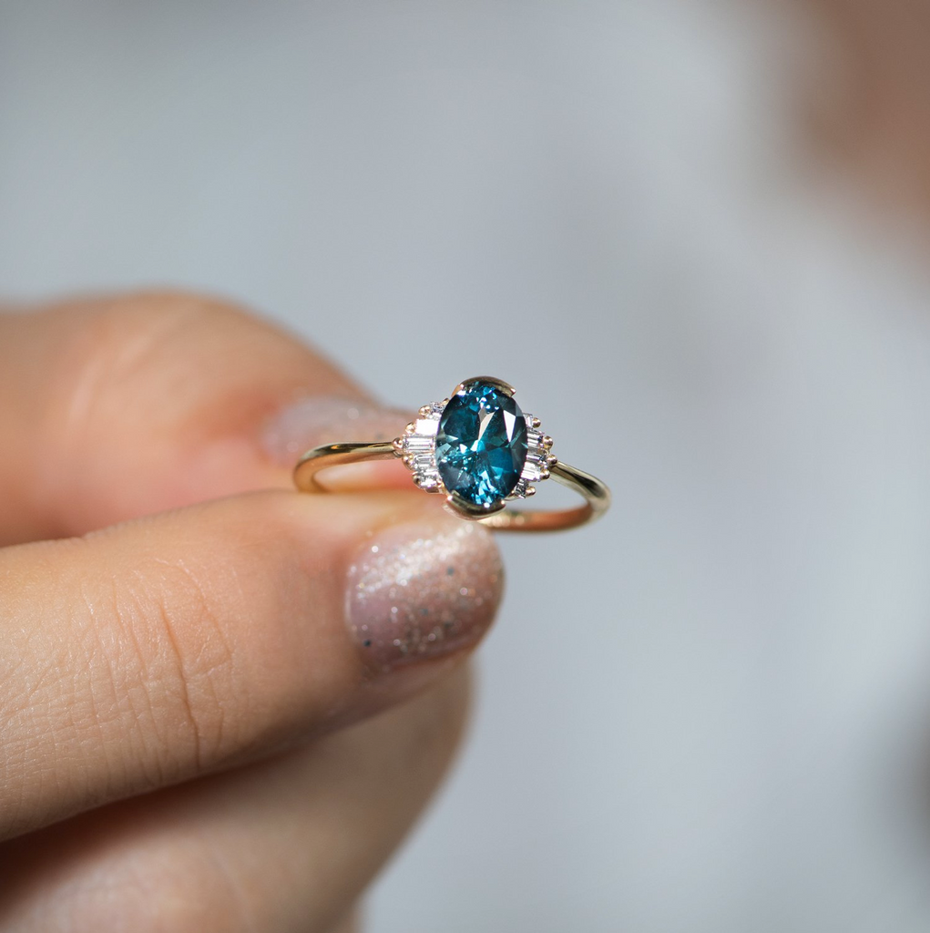 Oval teal sapphire deals ring